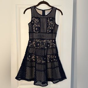 Girls dress. Navy. Size 14.